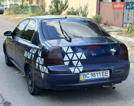 Синій Кіа Шума, об'ємом двигуна 1.5 л та пробігом 300 тис. км за 1600 $, фото 3 на Automoto.ua