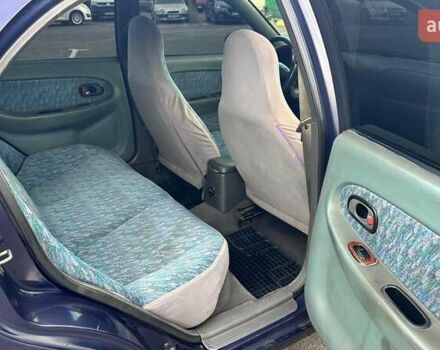 Синий Киа Шума, объемом двигателя 1.8 л и пробегом 310 тыс. км за 1500 $, фото 6 на Automoto.ua