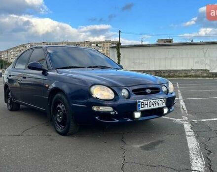 Синий Киа Шума, объемом двигателя 1.8 л и пробегом 310 тыс. км за 1500 $, фото 1 на Automoto.ua