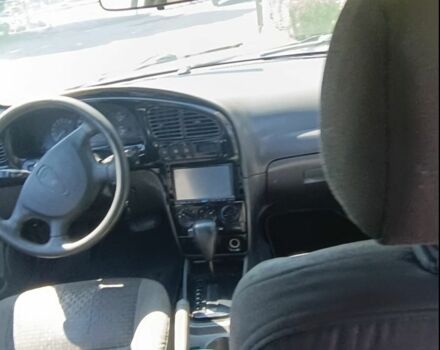 Синій Кіа Шума, об'ємом двигуна 1.6 л та пробігом 300 тис. км за 1200 $, фото 4 на Automoto.ua