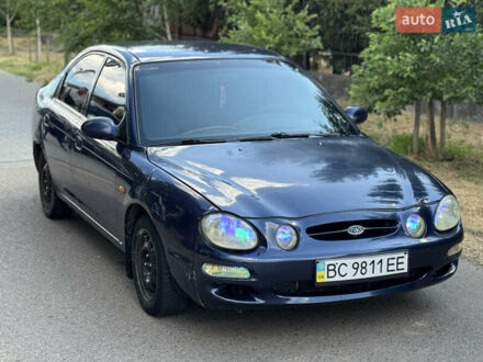 Синий Киа Шума, объемом двигателя 1.5 л и пробегом 300 тыс. км за 1600 $, фото 1 на Automoto.ua