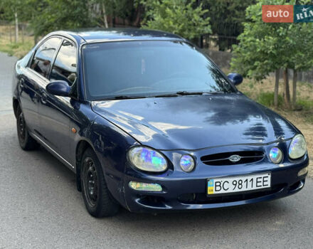 Синій Кіа Шума, об'ємом двигуна 1.5 л та пробігом 300 тис. км за 1600 $, фото 1 на Automoto.ua
