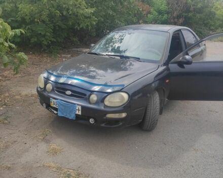 Синій Кіа Шума, об'ємом двигуна 1.8 л та пробігом 350 тис. км за 873 $, фото 1 на Automoto.ua