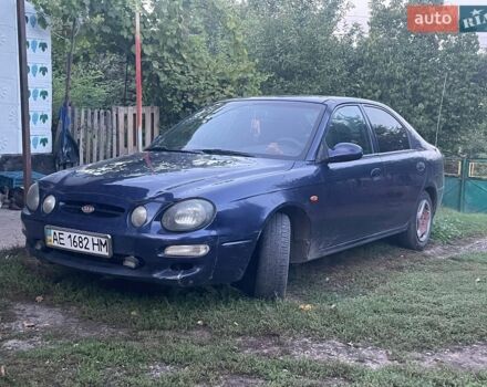 Синий Киа Шума, объемом двигателя 1.8 л и пробегом 211 тыс. км за 1350 $, фото 1 на Automoto.ua
