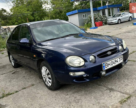 Синій Кіа Шума, об'ємом двигуна 1.5 л та пробігом 306 тис. км за 2400 $, фото 1 на Automoto.ua