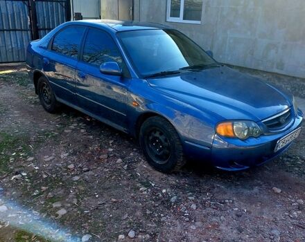 Синий Киа Шума, объемом двигателя 1.8 л и пробегом 300 тыс. км за 1500 $, фото 1 на Automoto.ua