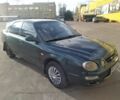 Зеленый Киа Шума, объемом двигателя 1.5 л и пробегом 240 тыс. км за 1807 $, фото 1 на Automoto.ua