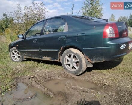 Зеленый Киа Шума, объемом двигателя 1.8 л и пробегом 130 тыс. км за 2600 $, фото 3 на Automoto.ua