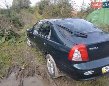 Зеленый Киа Шума, объемом двигателя 1.8 л и пробегом 130 тыс. км за 2600 $, фото 12 на Automoto.ua