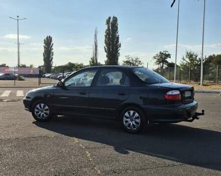 Зеленый Киа Шума, объемом двигателя 1.5 л и пробегом 328 тыс. км за 2000 $, фото 5 на Automoto.ua