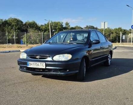 Зеленый Киа Шума, объемом двигателя 1.5 л и пробегом 328 тыс. км за 2000 $, фото 2 на Automoto.ua