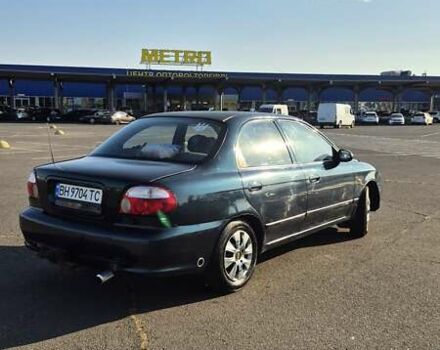 Зеленый Киа Шума, объемом двигателя 1.5 л и пробегом 328 тыс. км за 2300 $, фото 8 на Automoto.ua