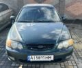 Зеленый Киа Шума, объемом двигателя 1.8 л и пробегом 313 тыс. км за 1700 $, фото 1 на Automoto.ua