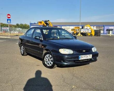 Зеленый Киа Шума, объемом двигателя 1.5 л и пробегом 328 тыс. км за 2000 $, фото 1 на Automoto.ua