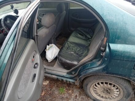 Зелений Кіа Шума, об'ємом двигуна 1.5 л та пробігом 460 тис. км за 1000 $, фото 1 на Automoto.ua