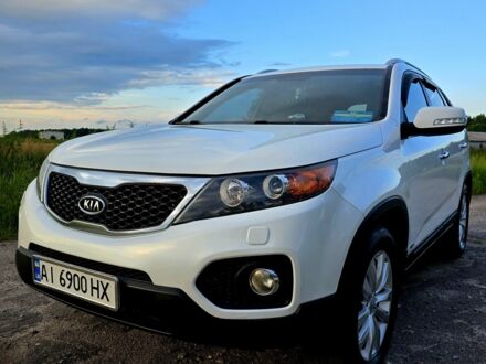 Белый Киа Соренто, объемом двигателя 2.4 л и пробегом 205 тыс. км за 11500 $, фото 1 на Automoto.ua