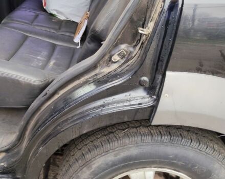 Черный Киа Соренто, объемом двигателя 2.5 л и пробегом 300 тыс. км за 3300 $, фото 9 на Automoto.ua