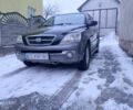Чорний Кіа Соренто, об'ємом двигуна 2.5 л та пробігом 200 тис. км за 7500 $, фото 1 на Automoto.ua