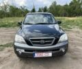 Черный Киа Соренто, объемом двигателя 2 л и пробегом 345 тыс. км за 4400 $, фото 1 на Automoto.ua