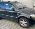 Черный Киа Соренто, объемом двигателя 2.5 л и пробегом 220 тыс. км за 6000 $, фото 1 на Automoto.ua