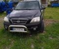 Черный Киа Соренто, объемом двигателя 2.5 л и пробегом 180 тыс. км за 5200 $, фото 1 на Automoto.ua