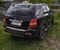 Черный Киа Соренто, объемом двигателя 2.5 л и пробегом 180 тыс. км за 5200 $, фото 2 на Automoto.ua