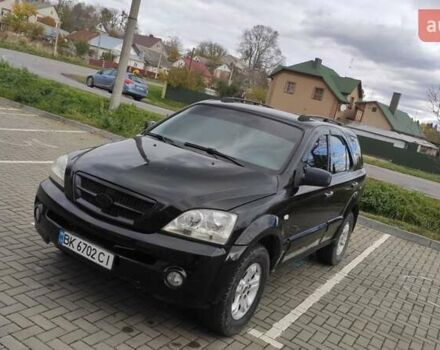 Черный Киа Соренто, объемом двигателя 2.5 л и пробегом 240 тыс. км за 7500 $, фото 2 на Automoto.ua