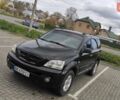 Черный Киа Соренто, объемом двигателя 2.5 л и пробегом 240 тыс. км за 7500 $, фото 2 на Automoto.ua