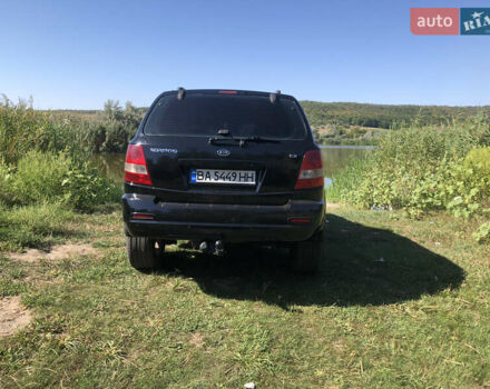 Черный Киа Соренто, объемом двигателя 2.5 л и пробегом 350 тыс. км за 7200 $, фото 33 на Automoto.ua