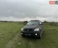 Черный Киа Соренто, объемом двигателя 2.5 л и пробегом 320 тыс. км за 5000 $, фото 1 на Automoto.ua