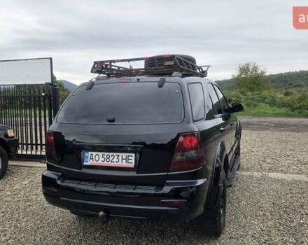 Черный Киа Соренто, объемом двигателя 2.5 л и пробегом 340 тыс. км за 5850 $, фото 11 на Automoto.ua