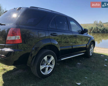 Черный Киа Соренто, объемом двигателя 2.5 л и пробегом 350 тыс. км за 7200 $, фото 34 на Automoto.ua