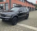 Черный Киа Соренто, объемом двигателя 2.5 л и пробегом 340 тыс. км за 5850 $, фото 1 на Automoto.ua