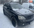 Черный Киа Соренто, объемом двигателя 2.5 л и пробегом 320 тыс. км за 4650 $, фото 1 на Automoto.ua