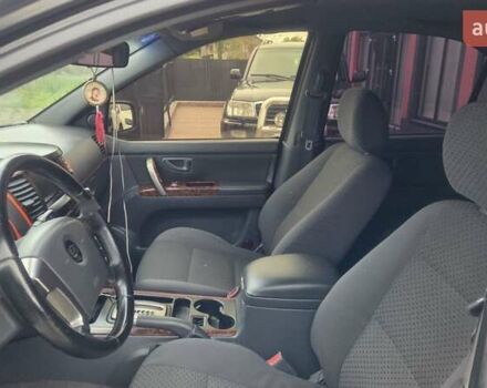 Черный Киа Соренто, объемом двигателя 2.5 л и пробегом 340 тыс. км за 5850 $, фото 17 на Automoto.ua