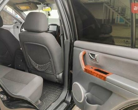 Черный Киа Соренто, объемом двигателя 2.5 л и пробегом 240 тыс. км за 7500 $, фото 14 на Automoto.ua