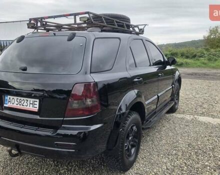 Черный Киа Соренто, объемом двигателя 2.5 л и пробегом 340 тыс. км за 5850 $, фото 2 на Automoto.ua