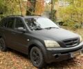 Черный Киа Соренто, объемом двигателя 2.5 л и пробегом 260 тыс. км за 3699 $, фото 1 на Automoto.ua