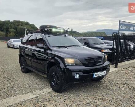 Черный Киа Соренто, объемом двигателя 2.5 л и пробегом 340 тыс. км за 5850 $, фото 5 на Automoto.ua