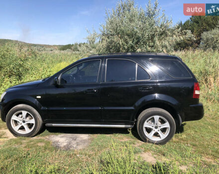 Черный Киа Соренто, объемом двигателя 2.5 л и пробегом 350 тыс. км за 7200 $, фото 31 на Automoto.ua