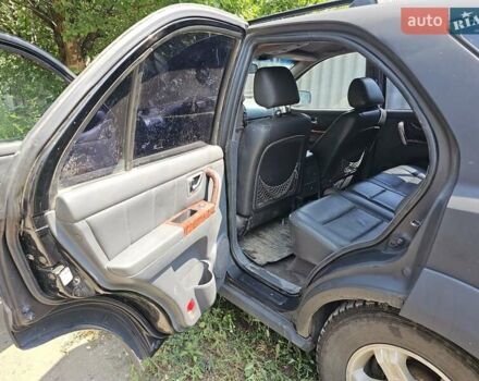Чорний Кіа Соренто, об'ємом двигуна 2.5 л та пробігом 400 тис. км за 5500 $, фото 2 на Automoto.ua
