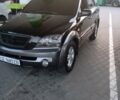 Черный Киа Соренто, объемом двигателя 2.5 л и пробегом 290 тыс. км за 6500 $, фото 1 на Automoto.ua