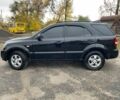 Чорний Кіа Соренто, об'ємом двигуна 2.5 л та пробігом 231 тис. км за 6999 $, фото 1 на Automoto.ua