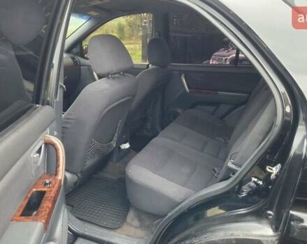 Черный Киа Соренто, объемом двигателя 2.5 л и пробегом 340 тыс. км за 5850 $, фото 14 на Automoto.ua