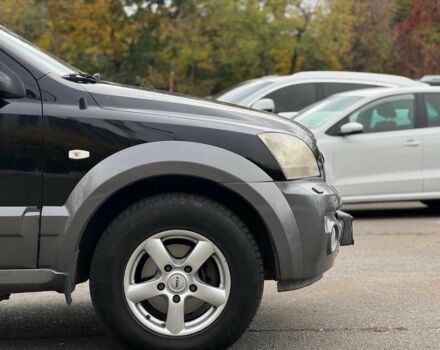 Черный Киа Соренто, объемом двигателя 2.5 л и пробегом 303 тыс. км за 6990 $, фото 13 на Automoto.ua