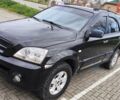 Черный Киа Соренто, объемом двигателя 2.5 л и пробегом 240 тыс. км за 7500 $, фото 1 на Automoto.ua