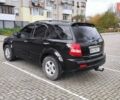 Черный Киа Соренто, объемом двигателя 2.5 л и пробегом 240 тыс. км за 7500 $, фото 4 на Automoto.ua