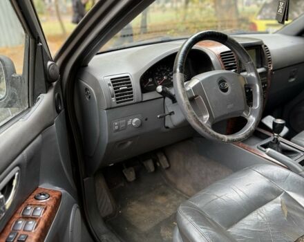 Черный Киа Соренто, объемом двигателя 2.5 л и пробегом 260 тыс. км за 3699 $, фото 12 на Automoto.ua