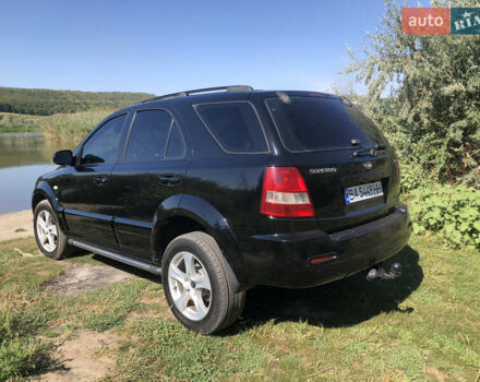 Черный Киа Соренто, объемом двигателя 2.5 л и пробегом 350 тыс. км за 7200 $, фото 32 на Automoto.ua