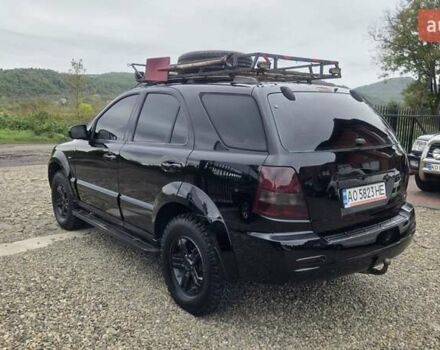 Черный Киа Соренто, объемом двигателя 2.5 л и пробегом 340 тыс. км за 5850 $, фото 6 на Automoto.ua